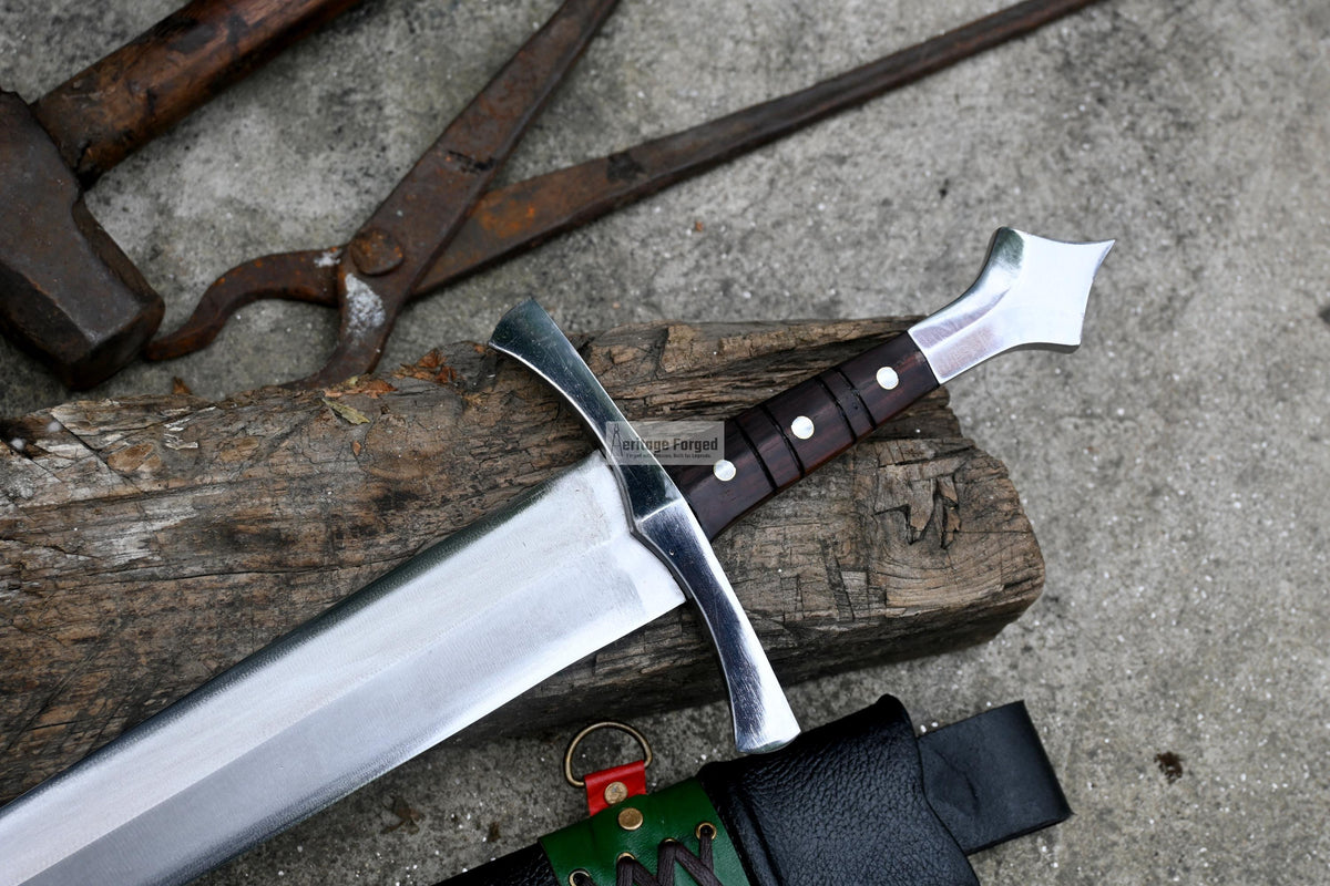 Rosewood handle detail on hand forged Viking dagger